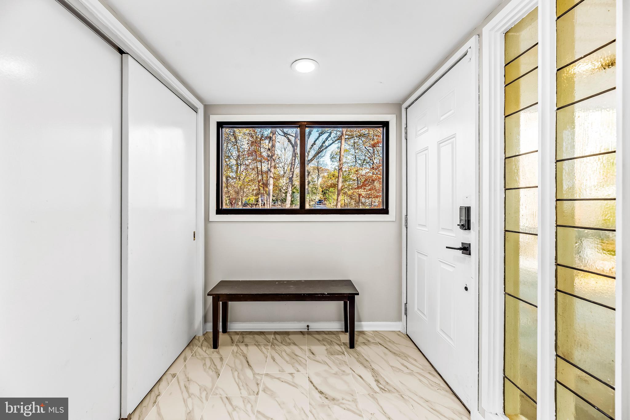3440 Holland Cliffs Road Huntingtown, MD 20639 - Photo 29 of 75 Foyer area with tile floor & lookout window