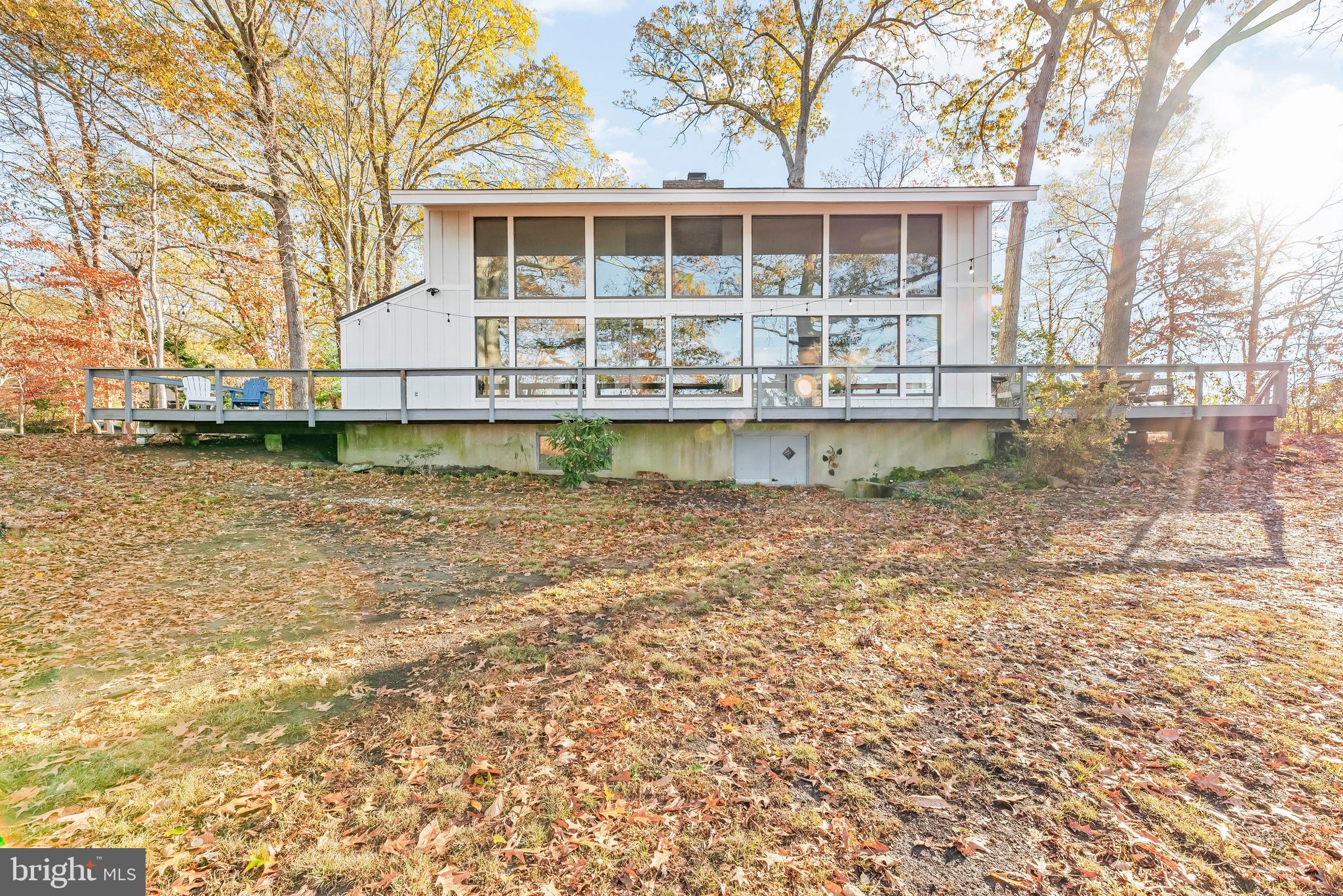 3440 Holland Cliffs Road Huntingtown, MD 20639 - Photo 4 of 75 Floor to ceiling windows to grasp every sunset!