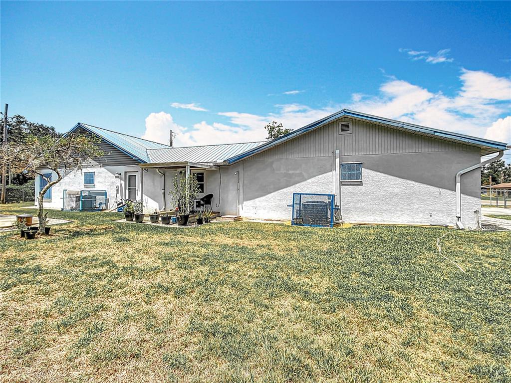 1405 East Clinton Street Bartow, FL 33830 - Photo 21 of 25 a house view with a outdoor space