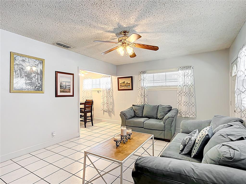 1405 East Clinton Street Bartow, FL 33830 - Photo 4 of 25 a living room with furniture and a large window