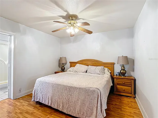 a bathroom with a double vanity sink mirror and shower