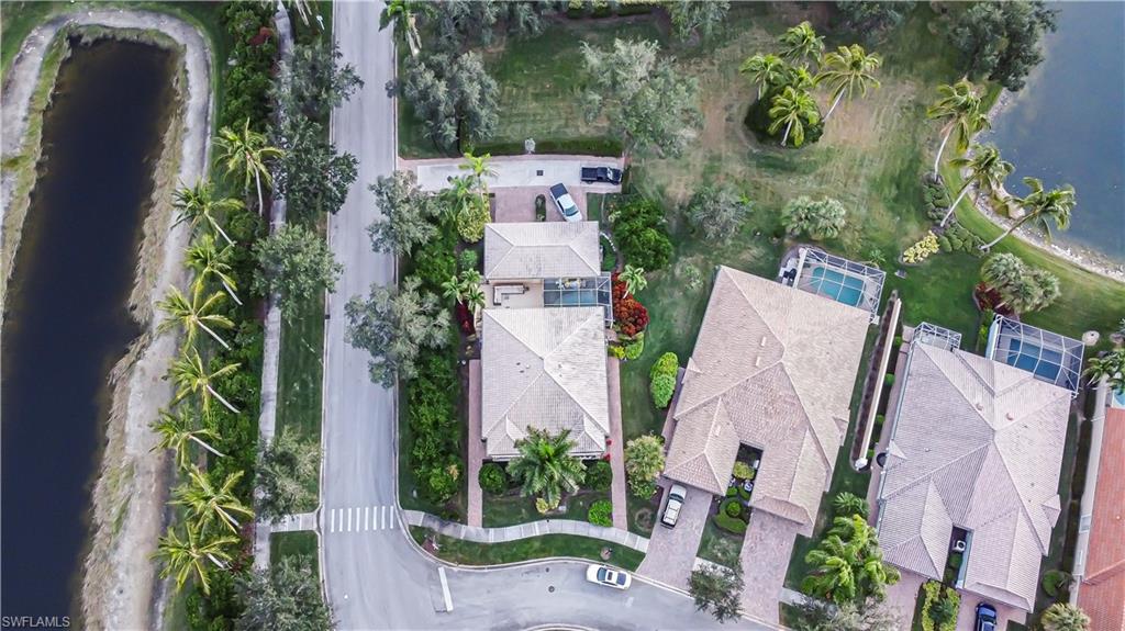 7201 Bellini Way Naples, FL 34114 - Photo 31 of 39 an aerial view of a house with garden space and seating area