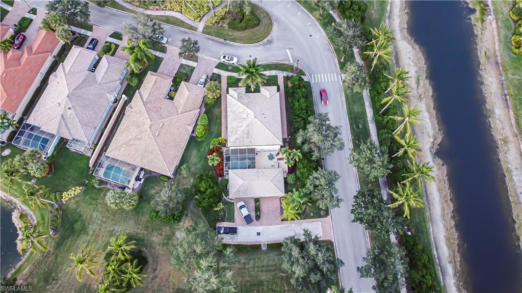 7201 Bellini Way Naples, FL 34114 - Photo 32 of 39 an aerial view of residential houses with outdoor space