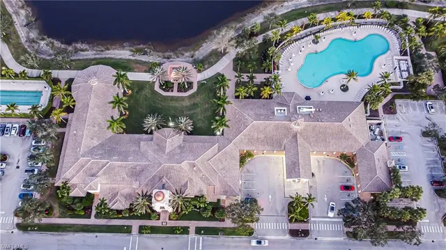 an aerial view of multiple houses with outdoor space