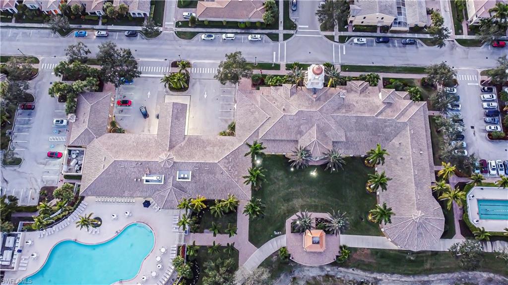 7201 Bellini Way Naples, FL 34114 - Photo 38 of 39 an aerial view of multiple houses with outdoor space