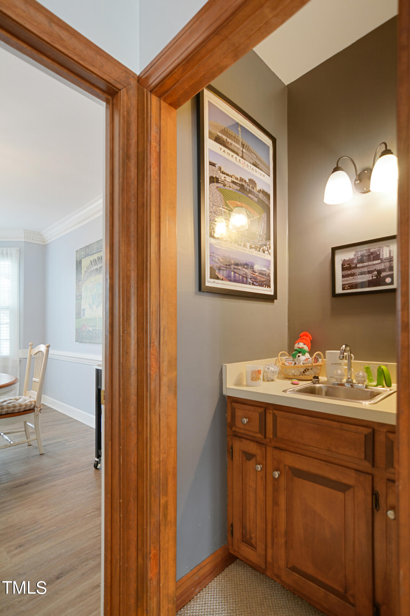 1811 Carrington Drive Raleigh, NC 27615 - Photo 6 of 23 a bathroom with a sink vanity and mirror