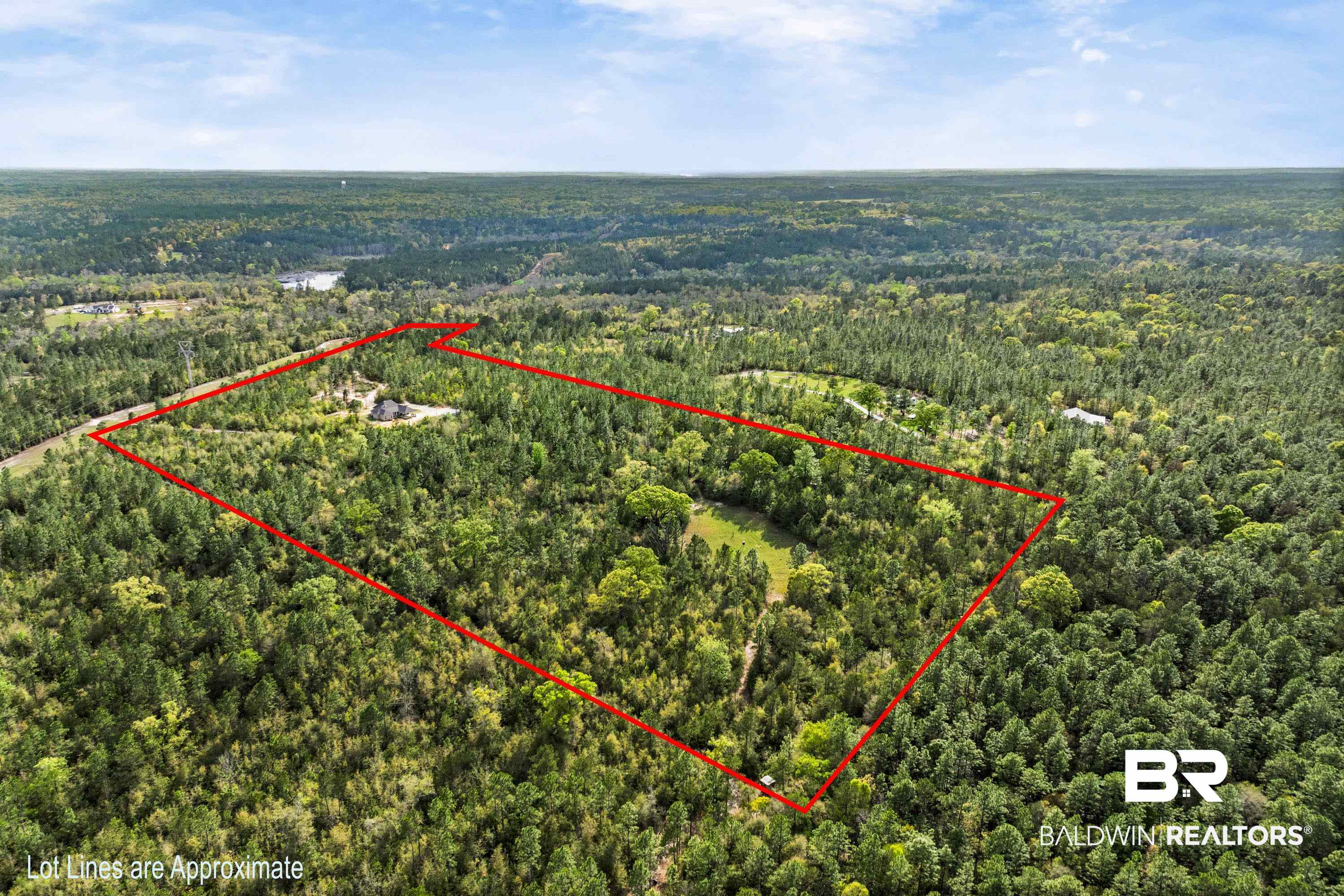 7150 Powell Road, Unit LOT 6A Eight Mile, AL 36613 - Photo 31 of 35 Aerial view of property and surrounding area with a forest and property boundaries highlighted