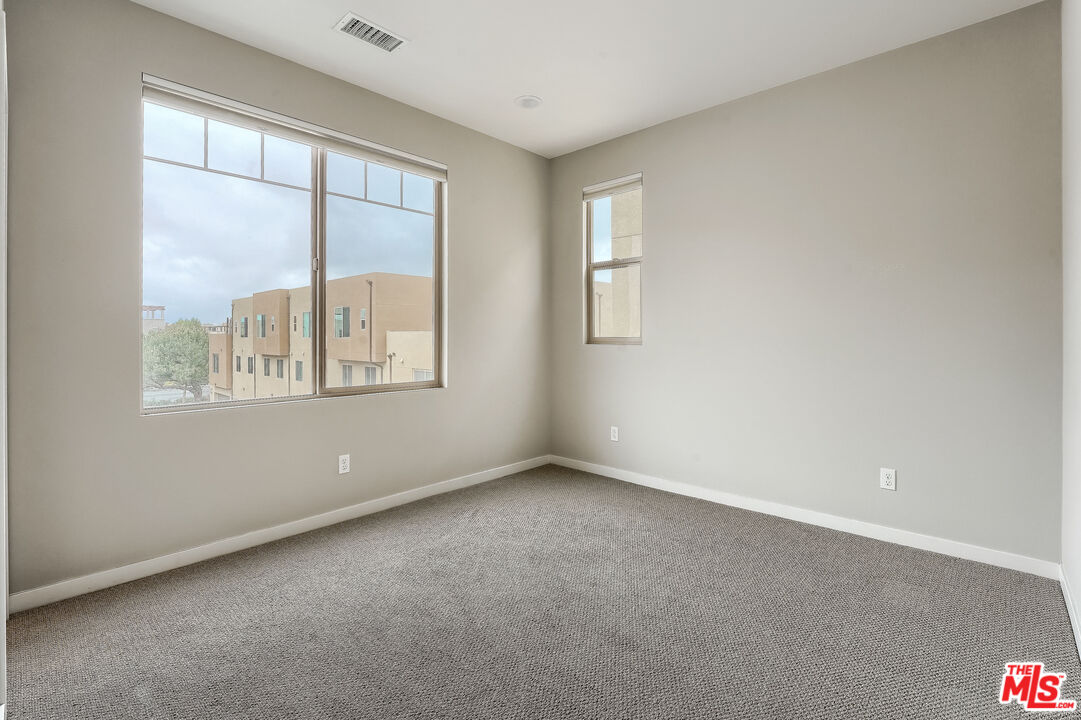 237 Magnet Irvine, CA 92618 - Photo 23 of 34 an empty room with a window