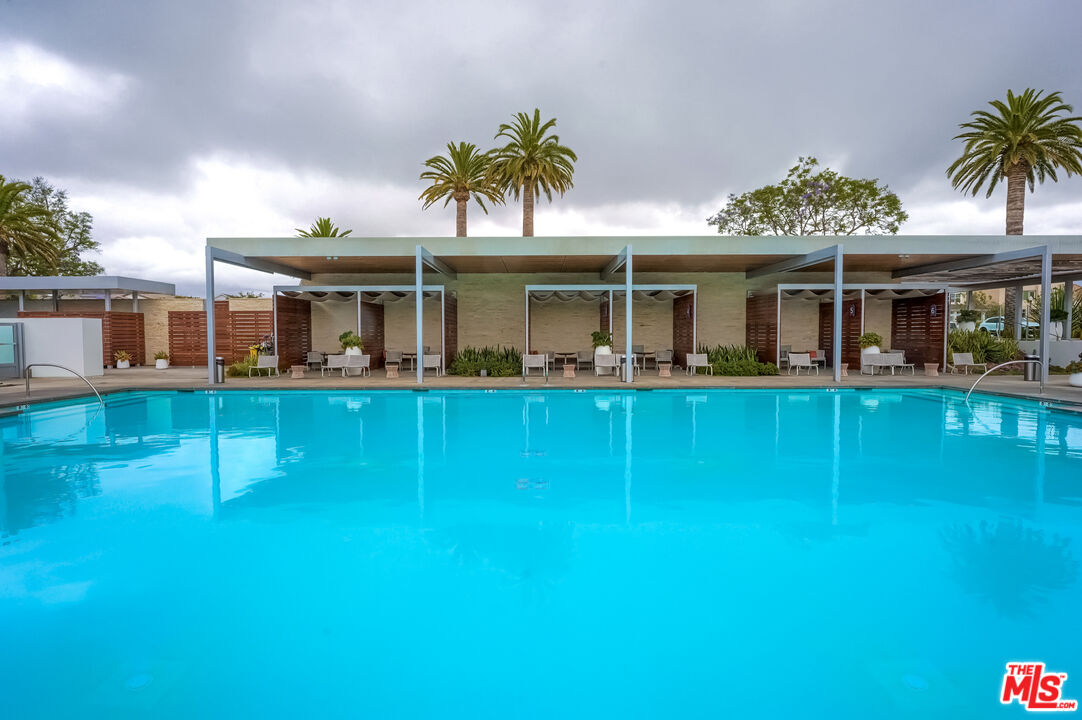 237 Magnet Irvine, CA 92618 - Photo 32 of 34 a front view of a house with swimming pool yard and outdoor seating