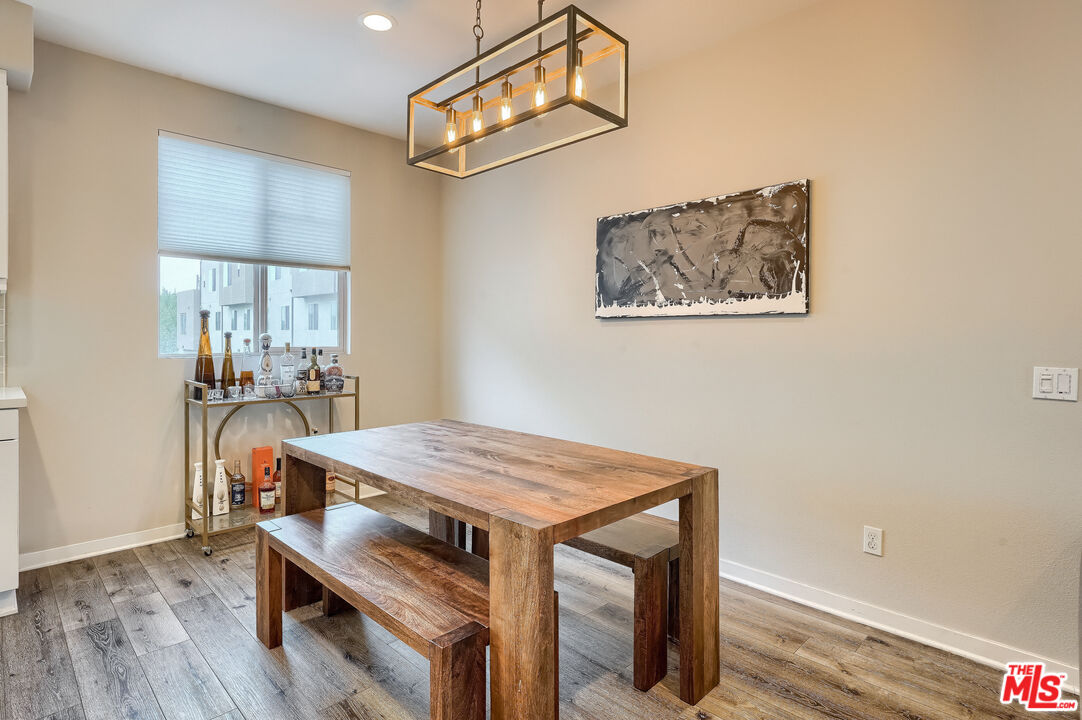 237 Magnet Irvine, CA 92618 - Photo 8 of 34 a dining room with a table and chairs