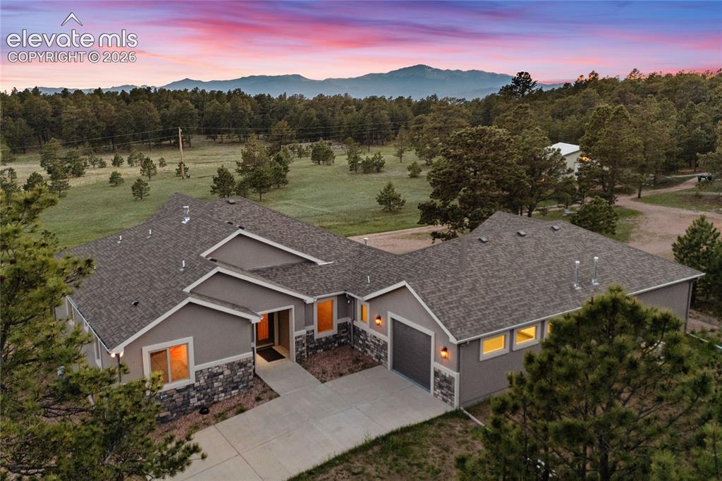 10840 Vollmer Road Colorado Springs, CO 80908 - Photo 3 of 49 an aerial view of a house