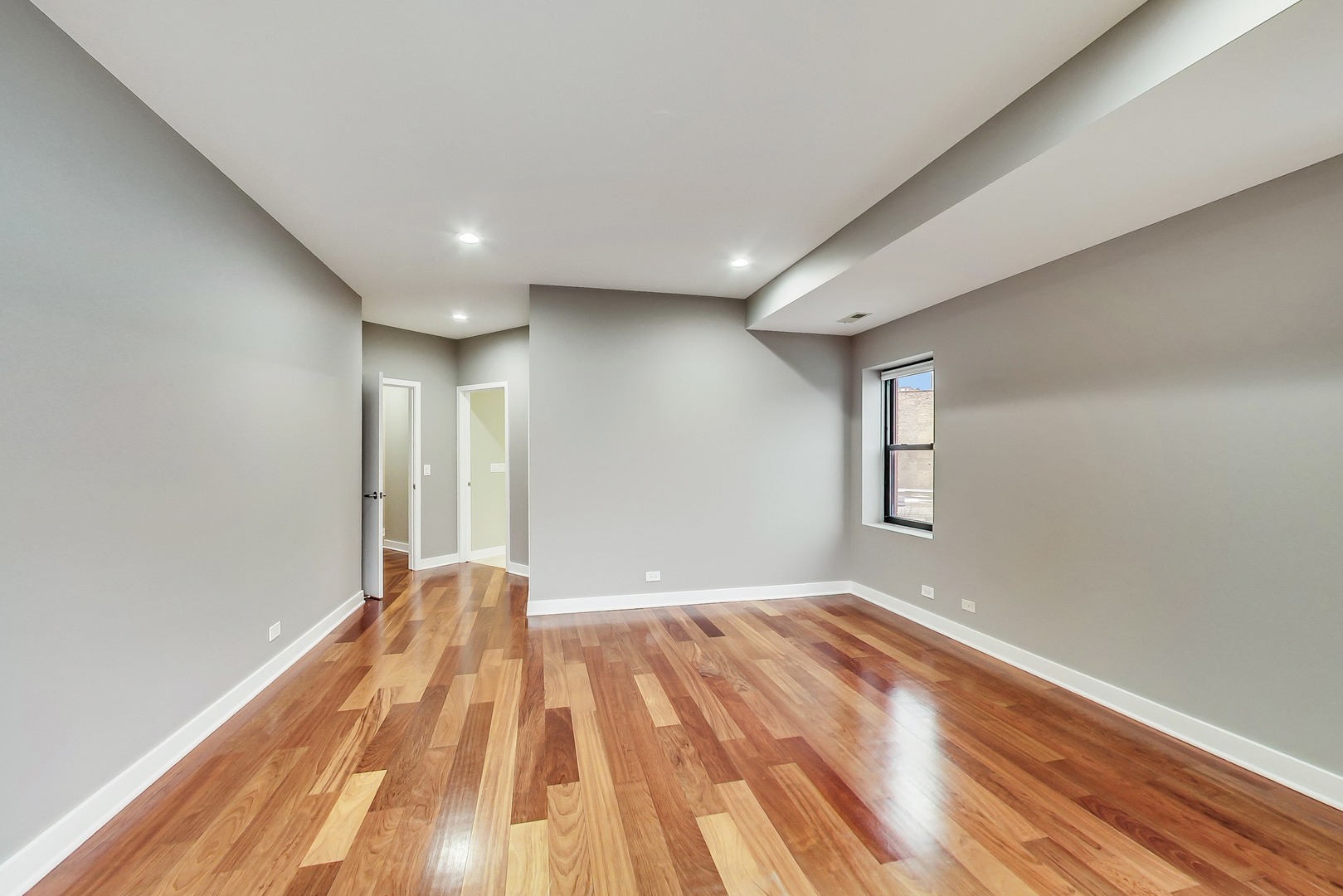 651 North Milwaukee Avenue, Unit 304 Chicago, IL 60642 - Photo 15 of 33 a view of empty room with wooden floor