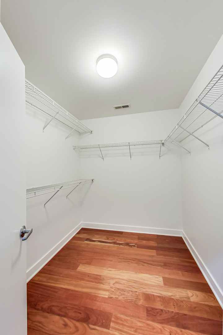 651 North Milwaukee Avenue, Unit 304 Chicago, IL 60642 - Photo 16 of 33 a view of a room with empty racks