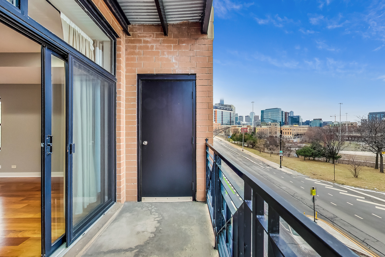 651 North Milwaukee Avenue, Unit 304 Chicago, IL 60642 - Photo 20 of 33 a view of swimming pool from a balcony