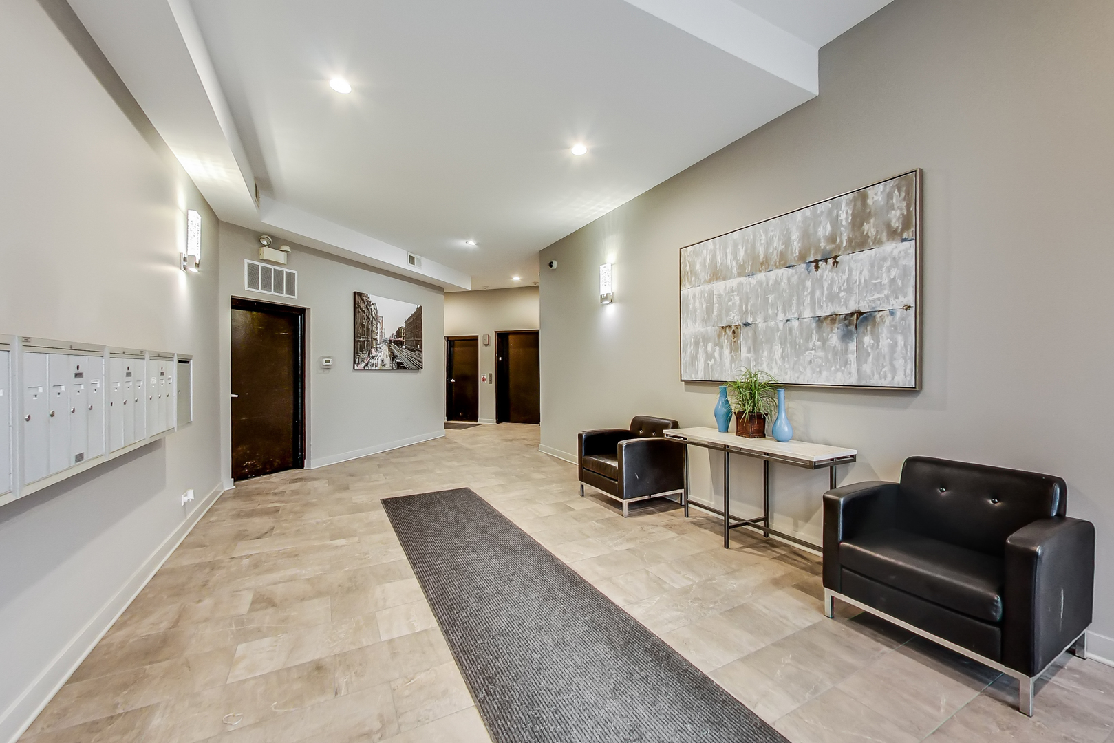 651 North Milwaukee Avenue, Unit 304 Chicago, IL 60642 - Photo 2 of 33 a living room with furniture and a couch