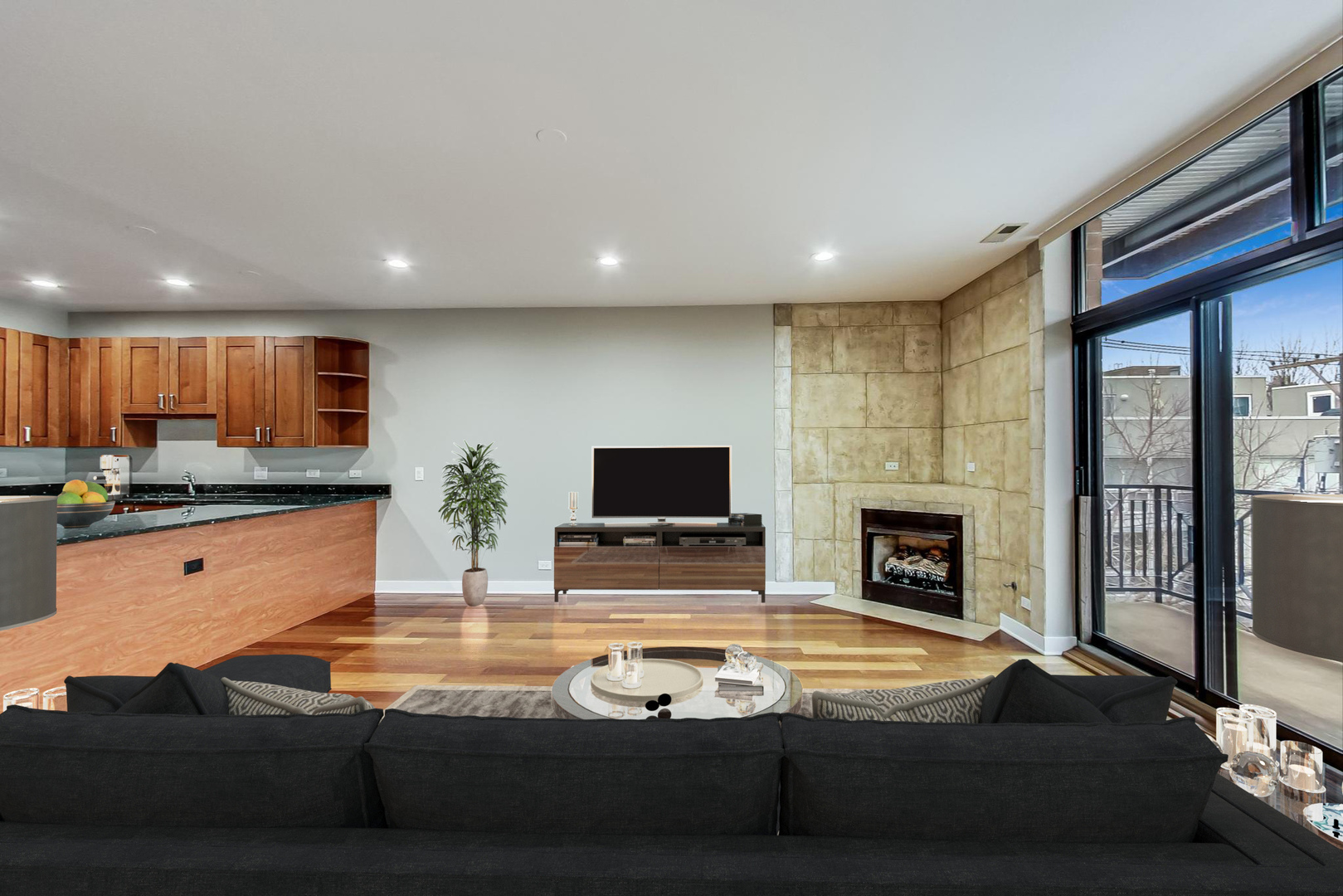 651 North Milwaukee Avenue, Unit 304 Chicago, IL 60642 - Photo 6 of 33 a living room with furniture a flat screen tv and a fireplace