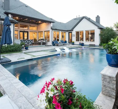 a view of a house with swimming pool