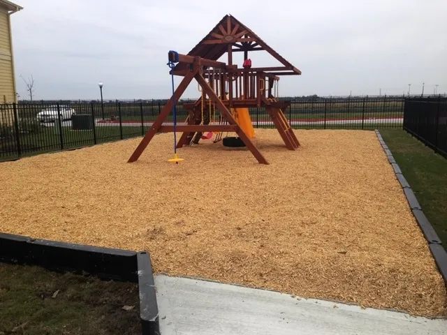 a view of a swimming pool with a bench