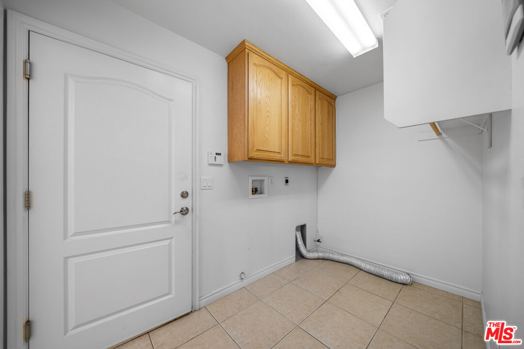11635 Lebec Road Phelan, CA 92371 - Photo 28 of 35 a view of cabinets with entryway