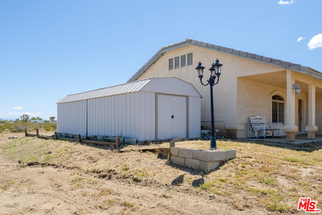 11635 Lebec Road Phelan, CA 92371 - Photo 30 of 35 a view of a backyard of a house