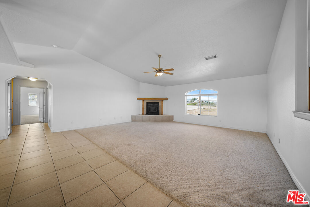 11635 Lebec Road Phelan, CA 92371 - Photo 8 of 35 a view of a livingroom with a fireplace
