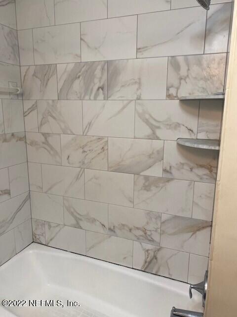 1789 River Road, Unit 2 Jacksonville, FL 32207 - Photo 13 of 22 a bathroom with a shower