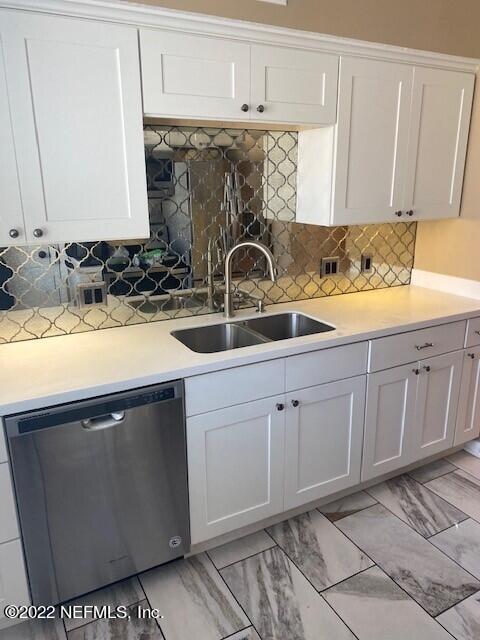 1789 River Road, Unit 2 Jacksonville, FL 32207 - Photo 15 of 22 a kitchen with sink cabinets and window