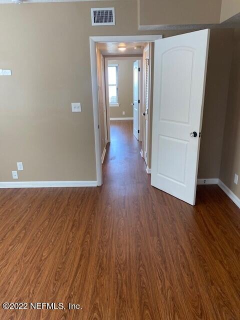 1789 River Road, Unit 2 Jacksonville, FL 32207 - Photo 6 of 22 a view of a hallway with wooden floor