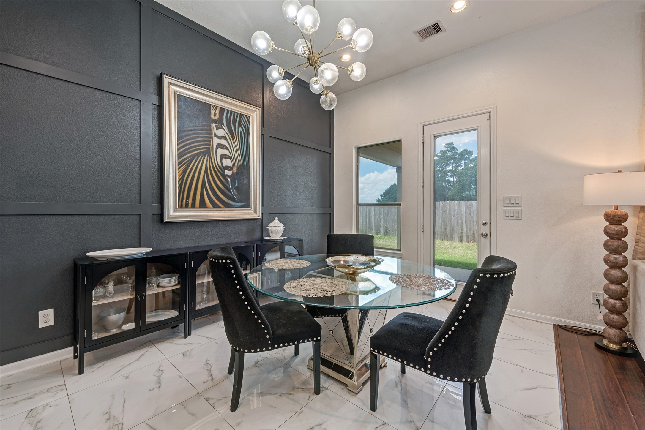 3554 Bennett Trails Drive Spring, TX 77386 - Photo 14 of 44 a view of a dining room with furniture and chandelier