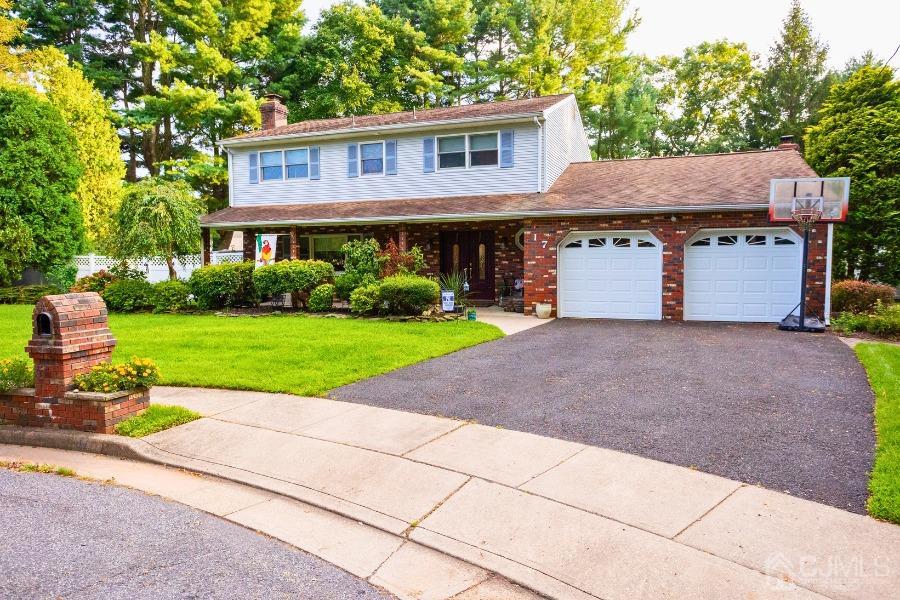 17 Ridgewood Avenue Monroe Township, NJ 08831 - Photo 2 of 16 a front view of a house with garden