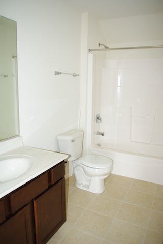 681 Ridgeview Lane Sugar Grove, IL 60554 - Photo 16 of 19 a bathroom with a sink a toilet and shower
