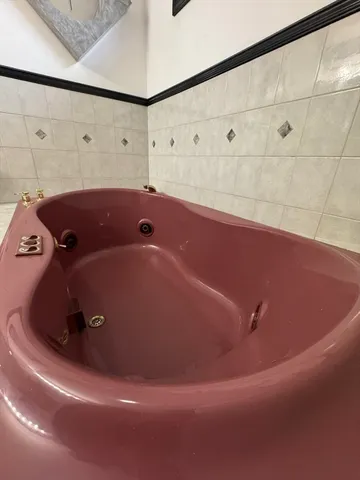 a bathroom with a bathtub