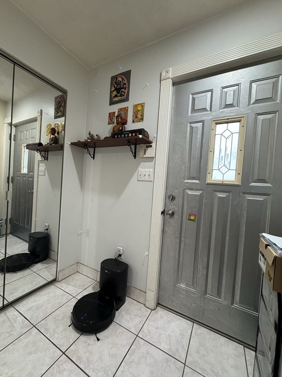 47 Shawmut Street Revere, MA 02151 - Photo 27 of 36 a view of a livingroom with wooden floor and a bathroom