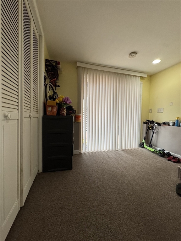 47 Shawmut Street Revere, MA 02151 - Photo 28 of 36 a view of livingroom with furniture and closet