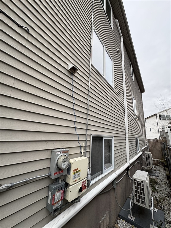 47 Shawmut Street Revere, MA 02151 - Photo 32 of 36 a view of a back yard of the house