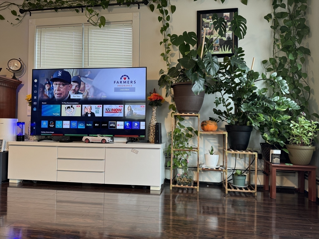 47 Shawmut Street Revere, MA 02151 - Photo 5 of 36 an aerial view of a house with sitting area