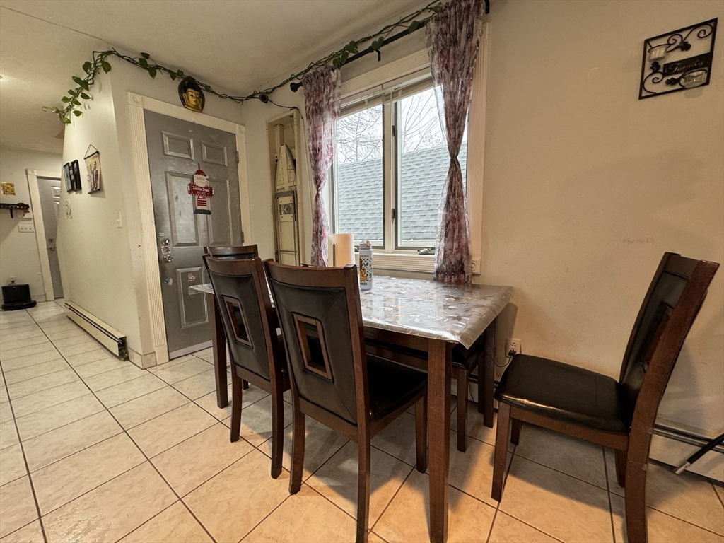47 Shawmut Street Revere, MA 02151 - Photo 9 of 36 a view of a dining room with furniture and window