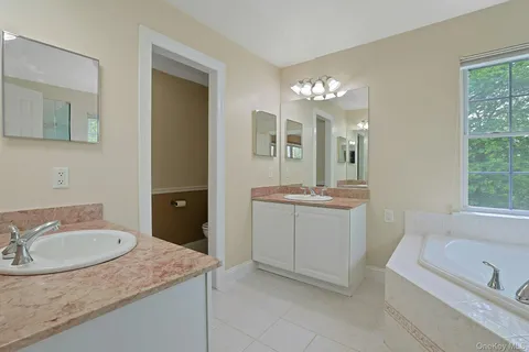 a picture of a bathroom with a shower