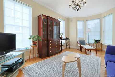 a kitchen with stainless steel appliances a stove a sink and a refrigerator