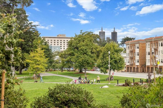 a view of a street with sitting area