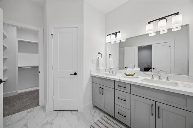 an empty room with windows and entrance