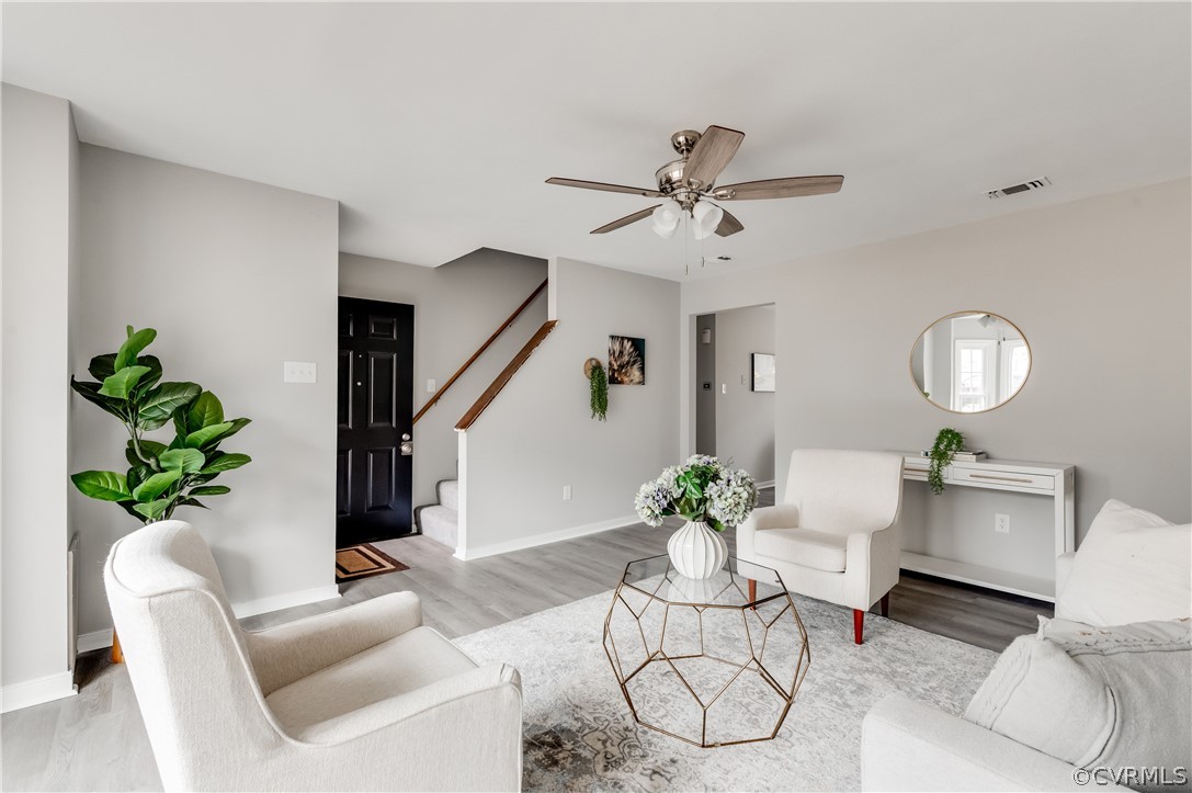 15615 Roland View Drive Chester, VA 23831 - Photo 3 of 35 a living room with furniture potted plant and a chandelier