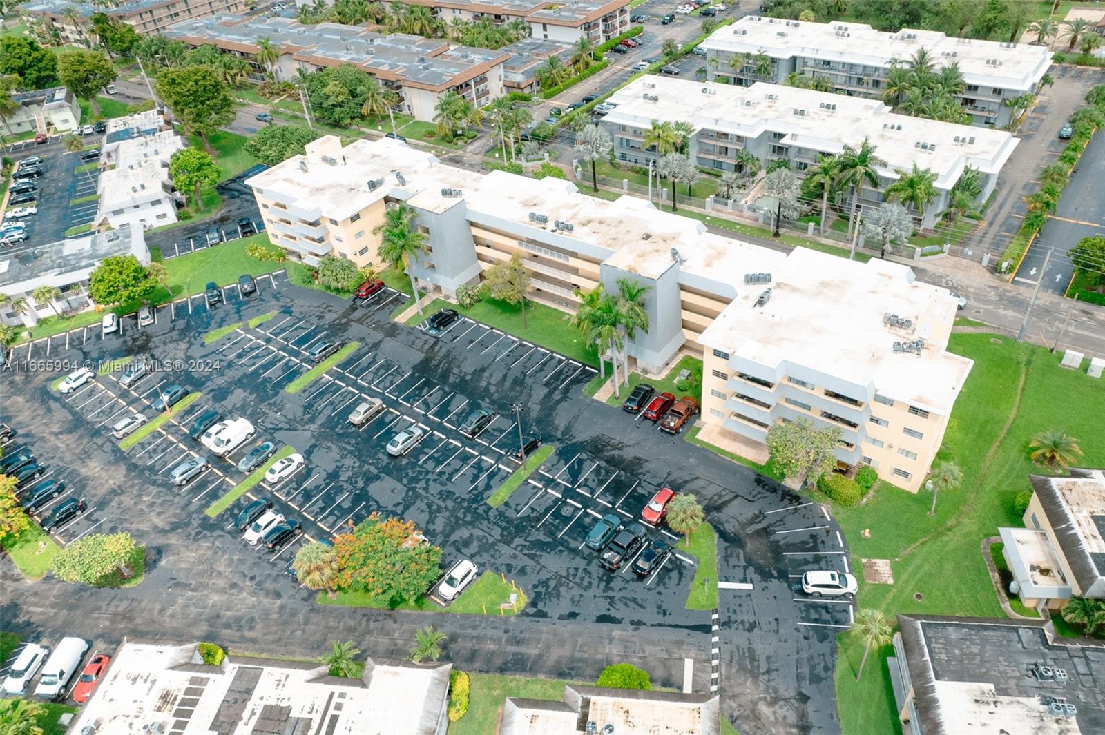7410 Southwest 82nd Street, Unit K302 Miami, FL 33143 - Photo 27 of 34 an aerial view of residential houses with outdoor space