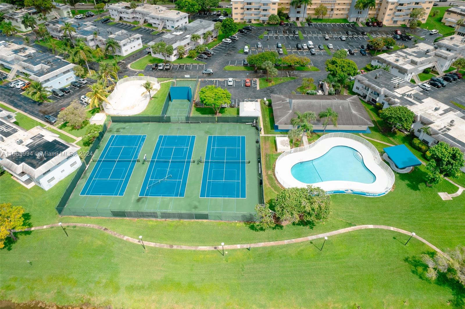 7410 Southwest 82nd Street, Unit K302 Miami, FL 33143 - Photo 31 of 34 an aerial view of a house