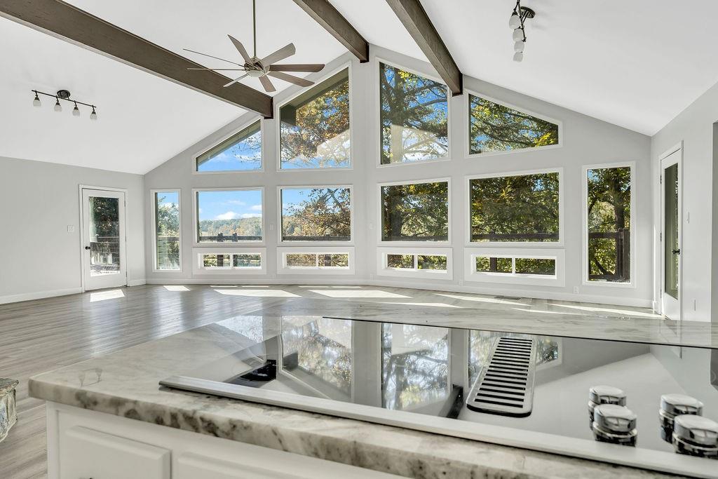 357 John's Way Talking Rock, GA 30175 - Photo 20 of 63 a view of a living room with furniture and floor to ceiling windows