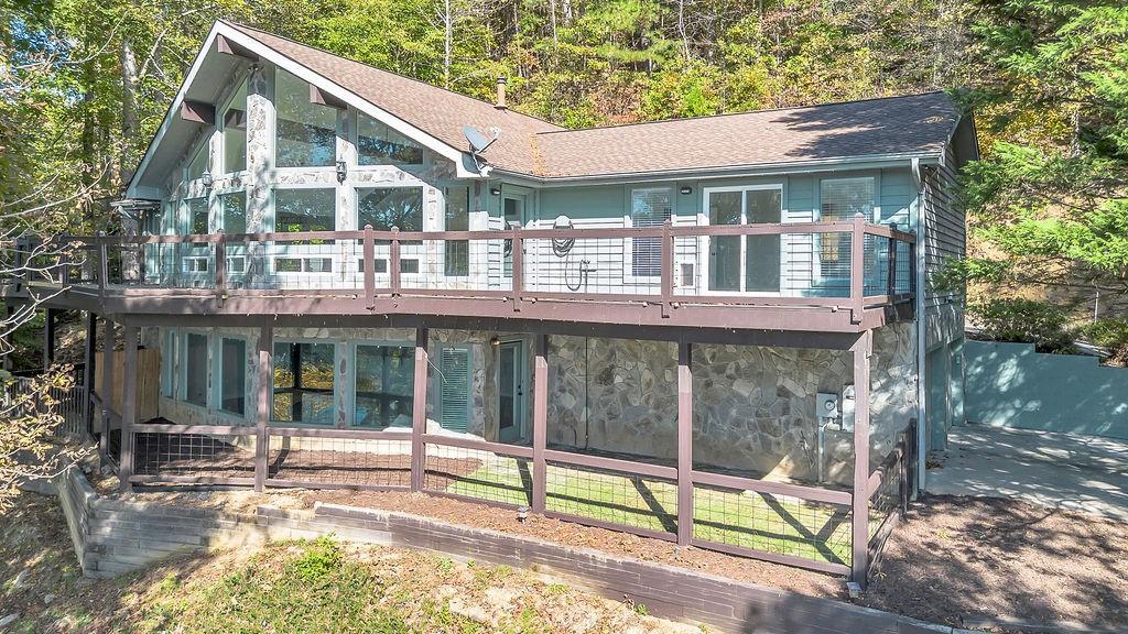 357 John's Way Talking Rock, GA 30175 - Photo 2 of 63 a view of a house with backyard and porch