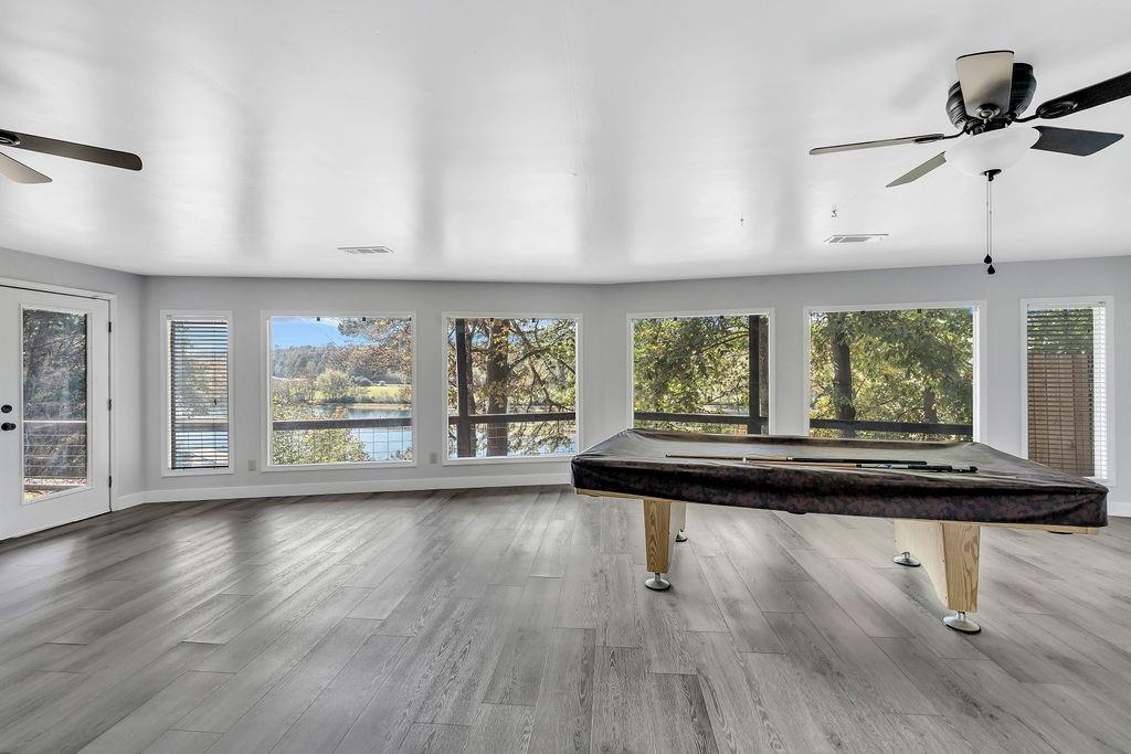 357 John's Way Talking Rock, GA 30175 - Photo 34 of 63 a view of front door with wooden floor and windows