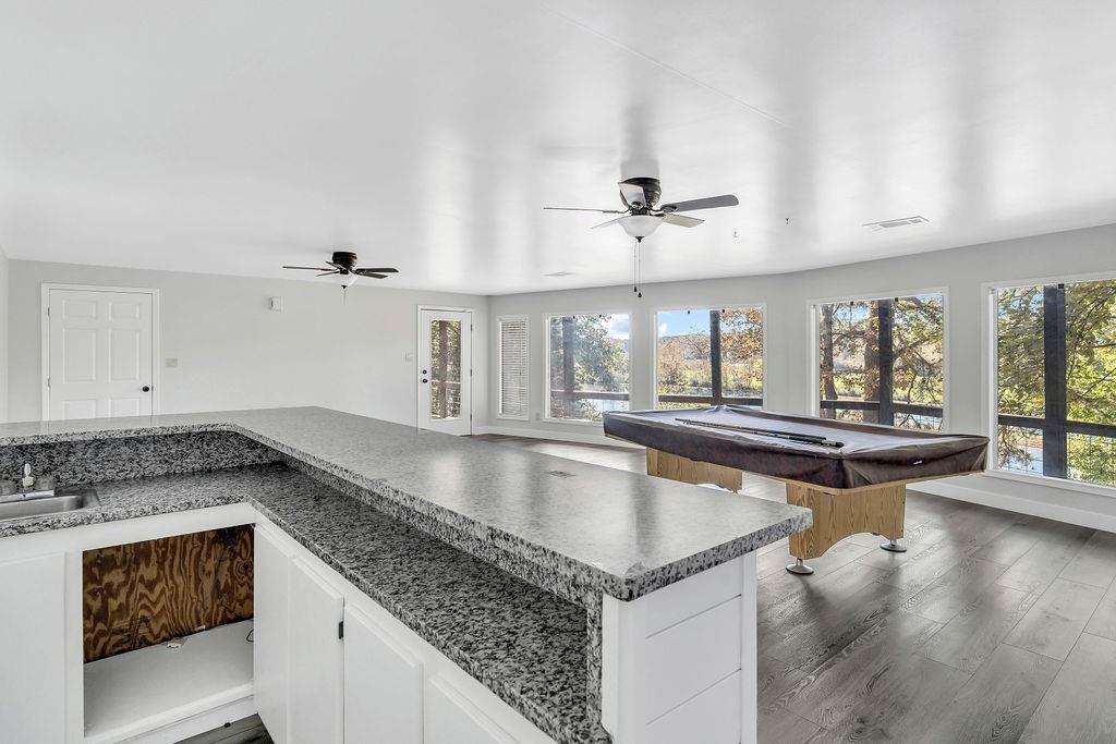 357 John's Way Talking Rock, GA 30175 - Photo 37 of 63 a kitchen with a counter space a sink and appliances