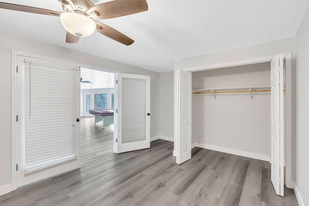 357 John's Way Talking Rock, GA 30175 - Photo 39 of 63 wooden floor in an empty room with a window
