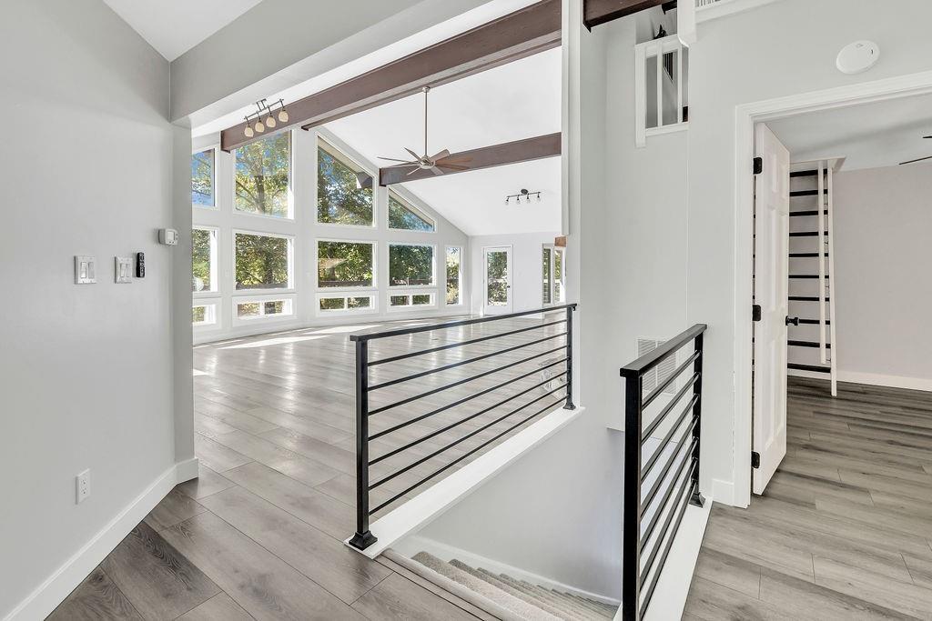 357 John's Way Talking Rock, GA 30175 - Photo 6 of 63 a view of a hallway with wooden floor and windows